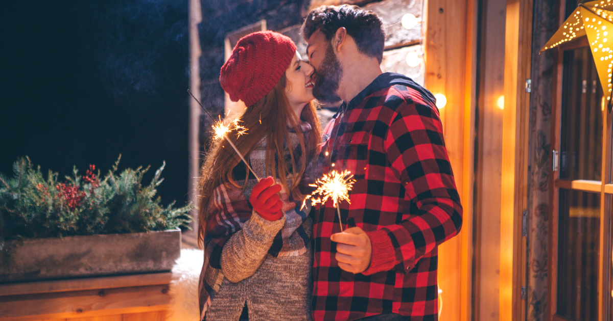 A couple sharing their first kiss